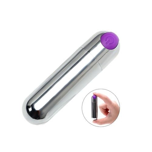 Mini bala vibradora recargable color morada punta redonda vista escala mano
